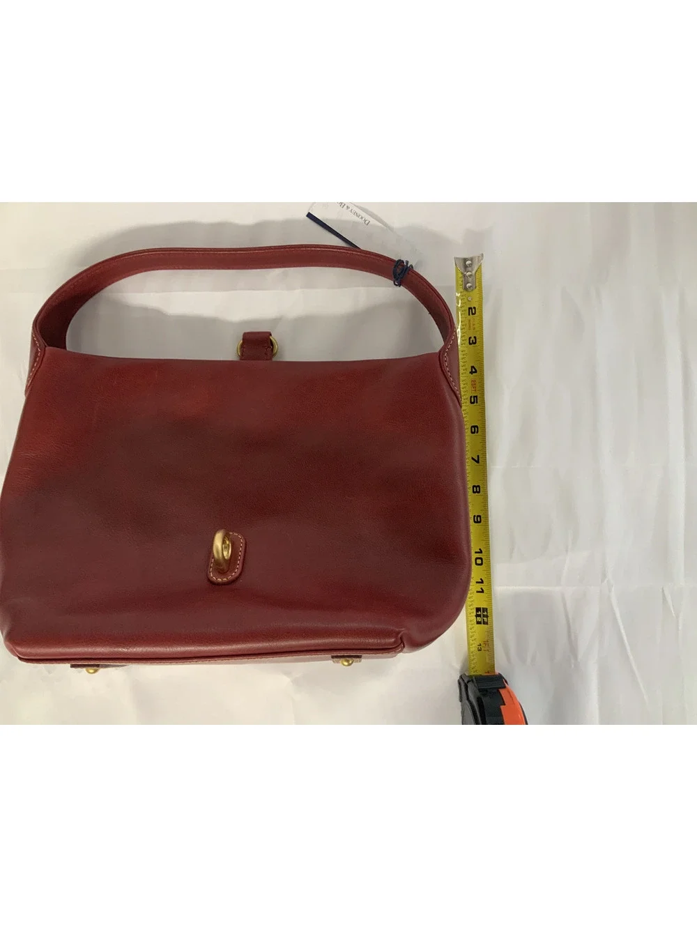 DOONEY AND BOURKE FLORENTINE LEATHER LOGO LOCK HOBO-READ DESCRIPTION